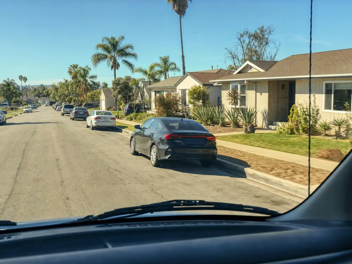 Service van arriving on a Milpitas, CA street — local same-day coverage